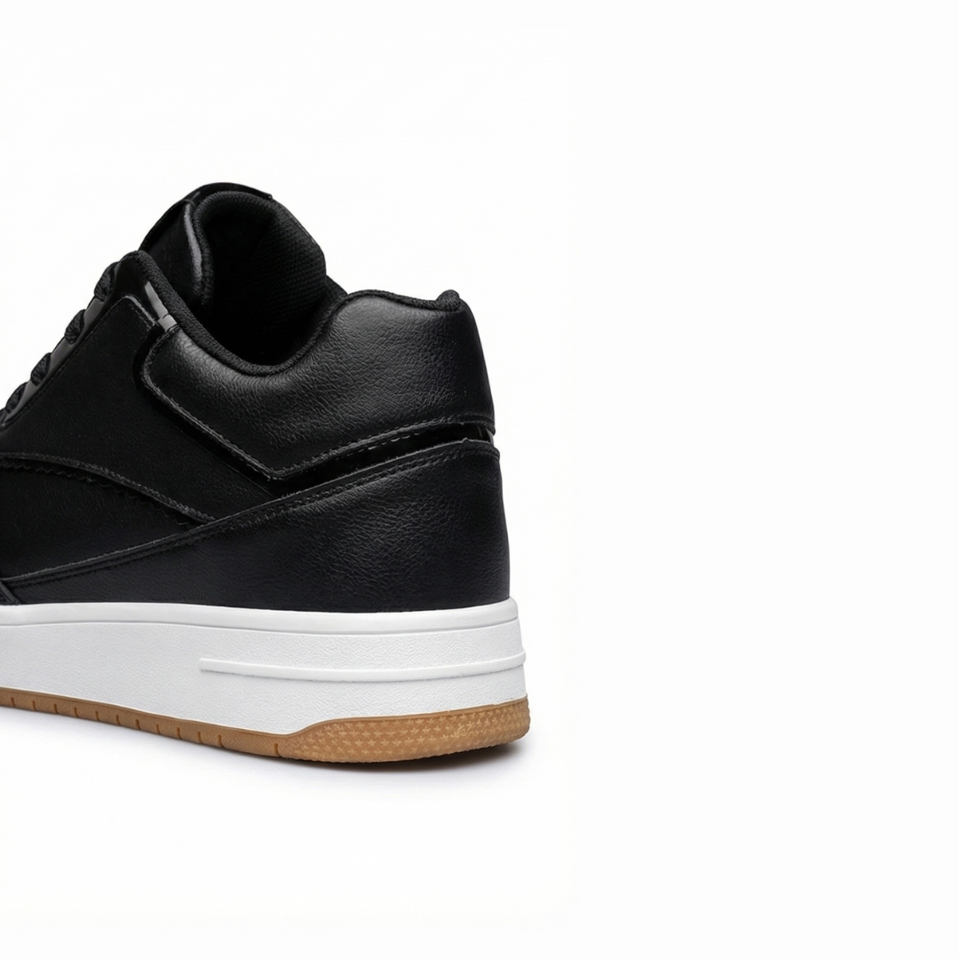 HEIGHTN Apex sneaker top-down view showing black laces and toebox perforations